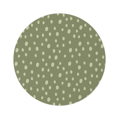 Sage Speckle round nursery rug on a baby room floor