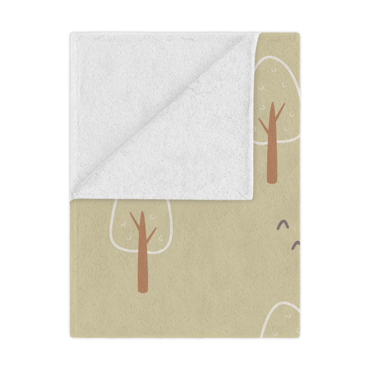 Scandi Forest minky baby blanket draped over a crib