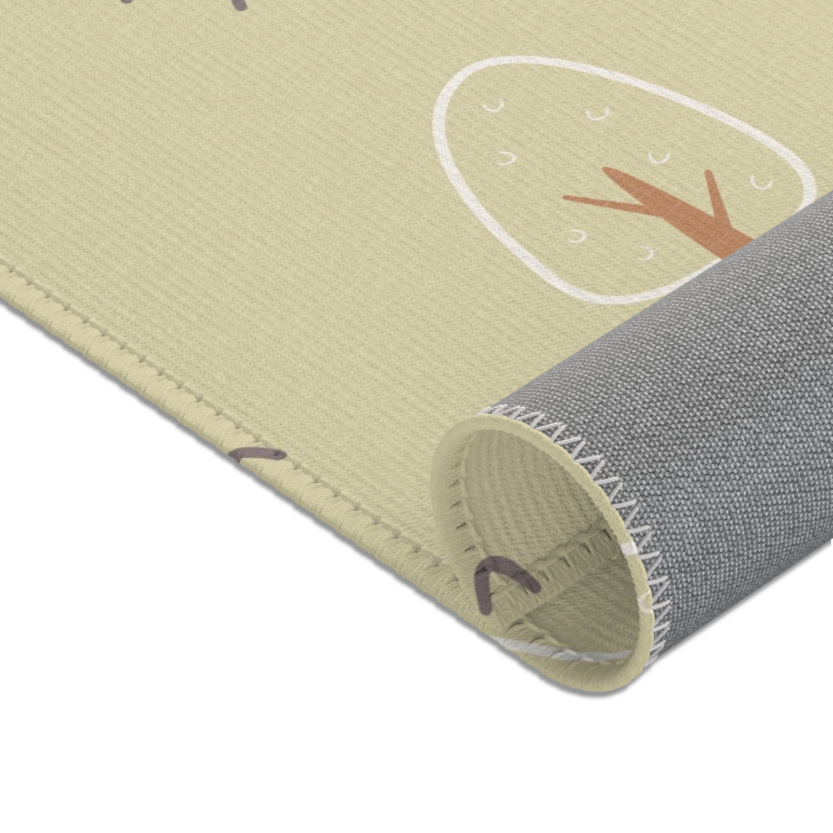 Minimal tree print area rug for a woodland nursery