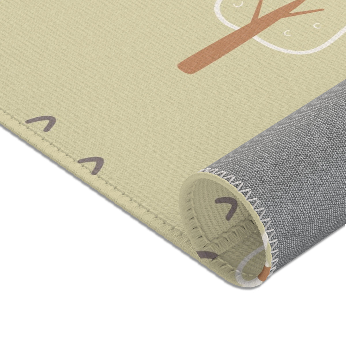 Scandinavian tree print rug on a pale floor