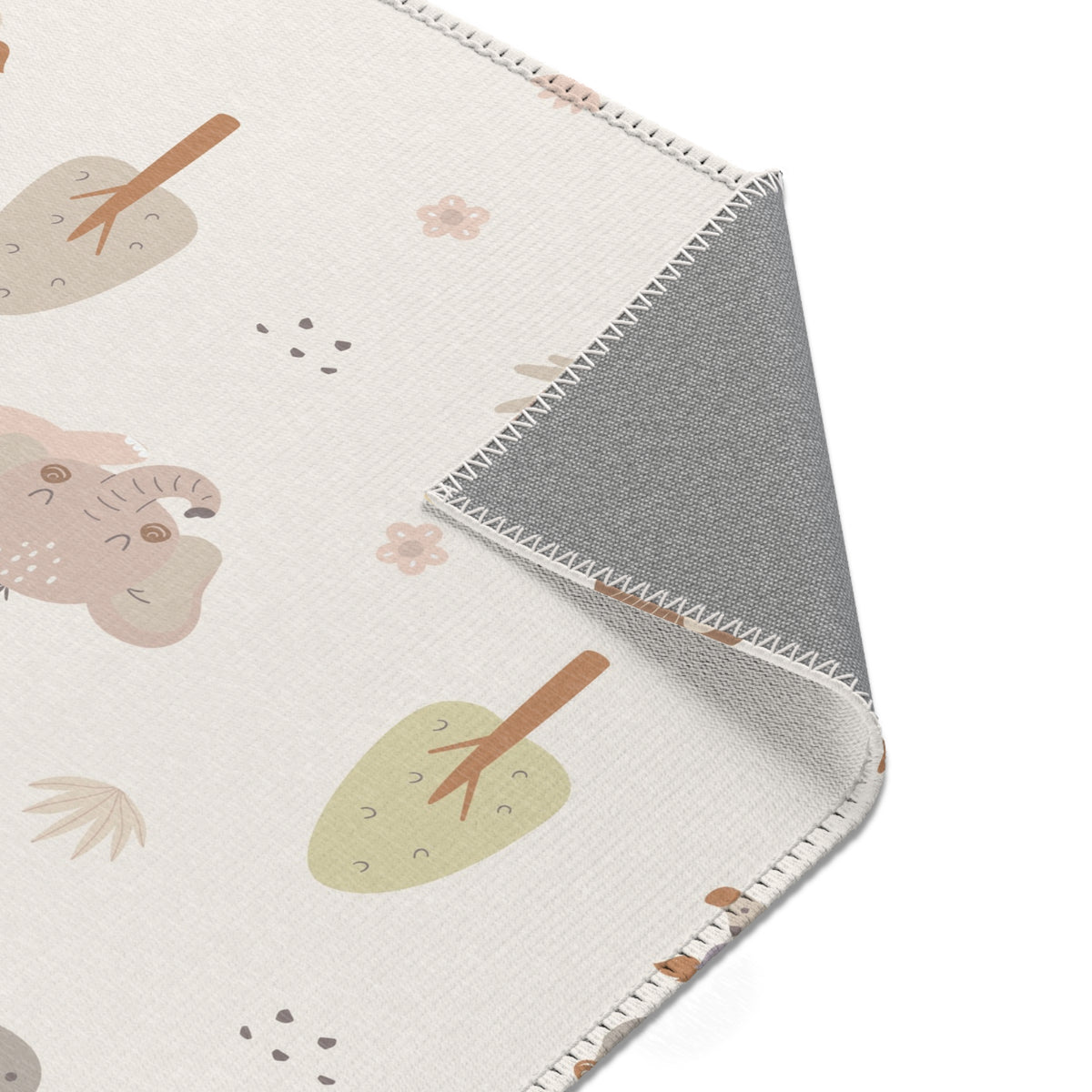 Sleepy safari area rug styled with nursery furniture
