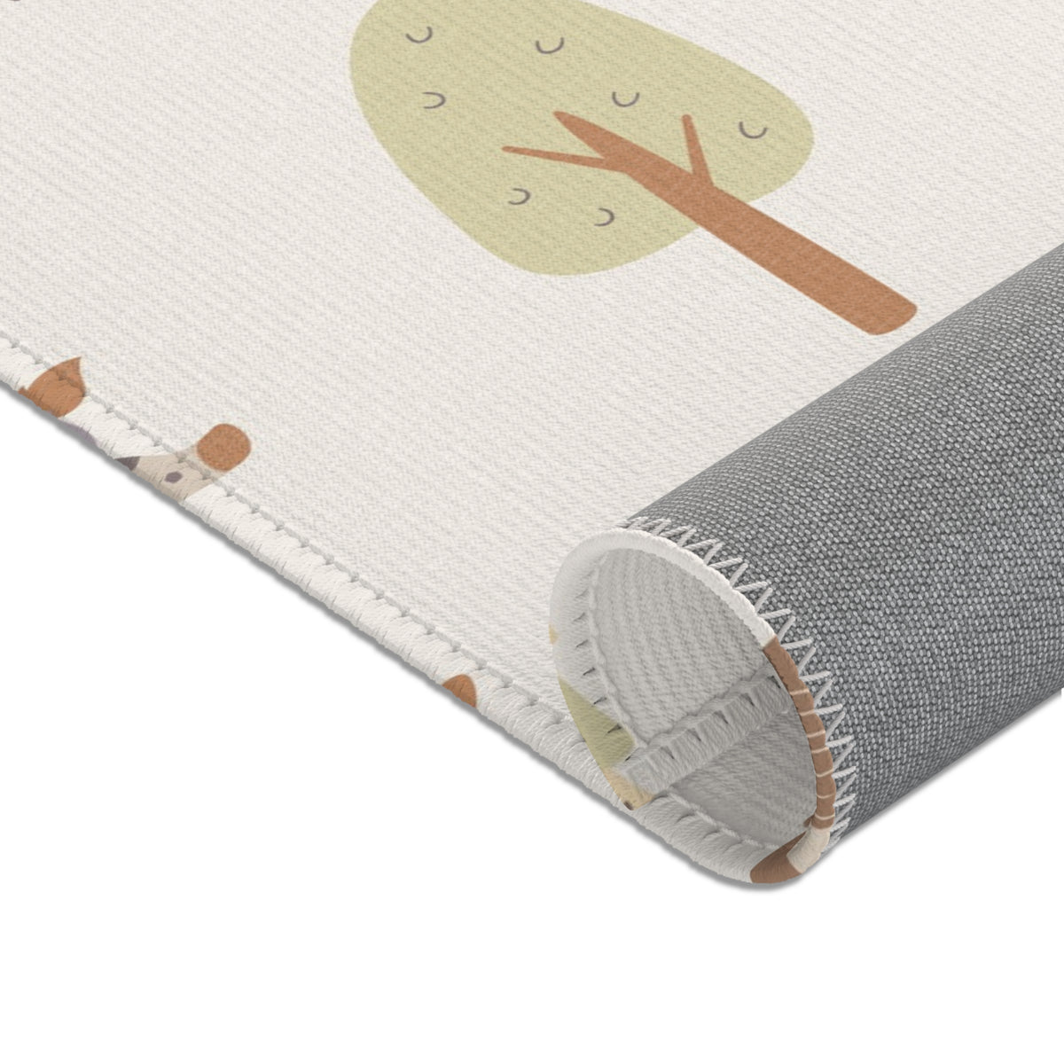 Cream safari print baby room rug in a styled nursery