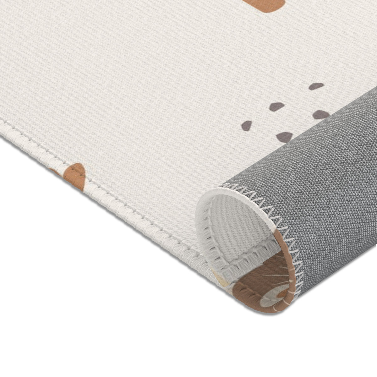 Neutral safari area rug in a baby nursery corner