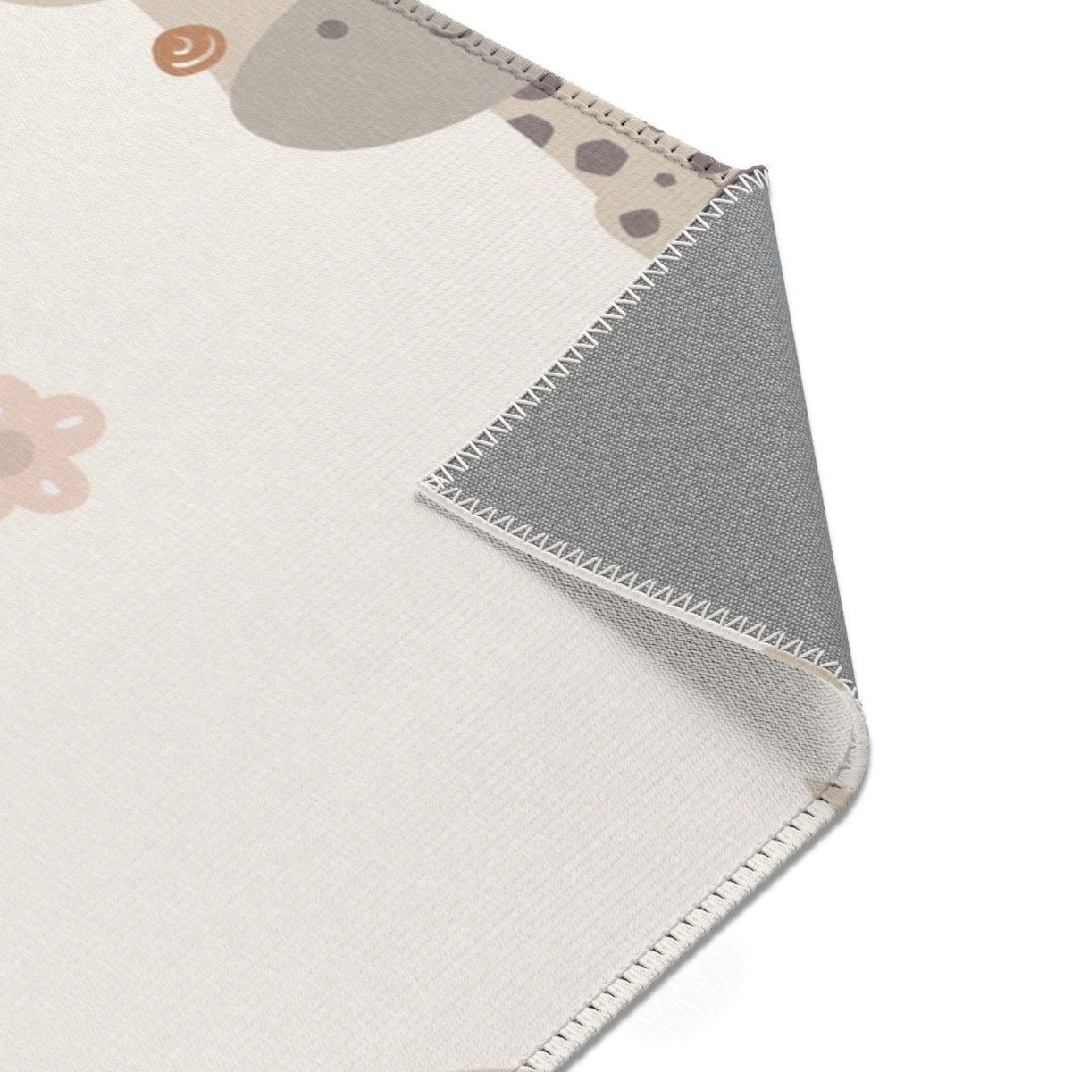 Sleepy safari rug seen from above in a nursery