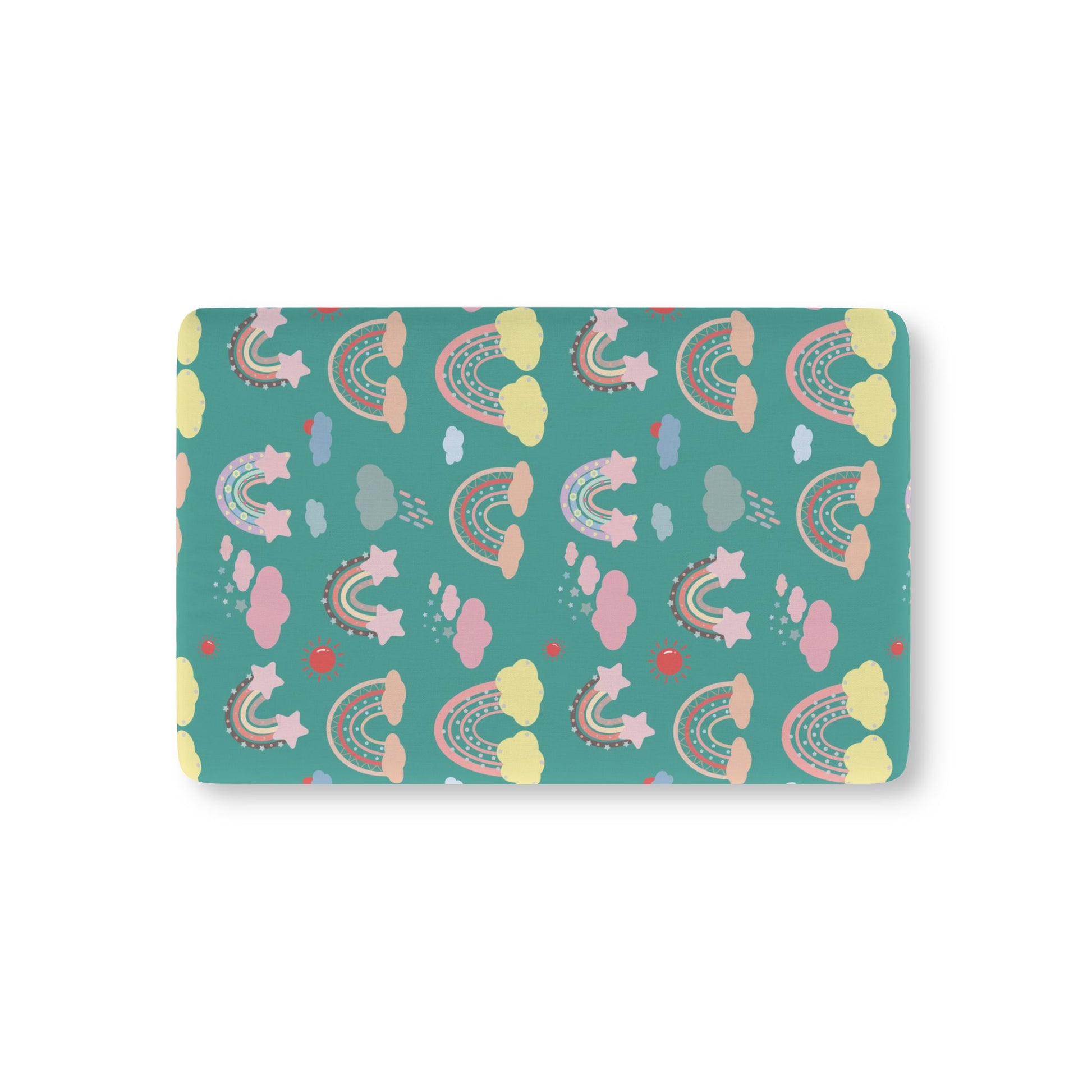 Teal Sky Rainbows fitted crib sheet on a nursery crib mattress