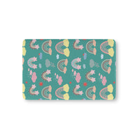 Teal Sky Rainbows fitted crib sheet on a nursery crib mattress