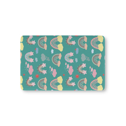Teal Sky Rainbows fitted crib sheet on a nursery crib mattress