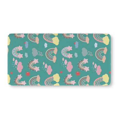 Fitted crib sheet with coral rainbows and clouds on deep teal