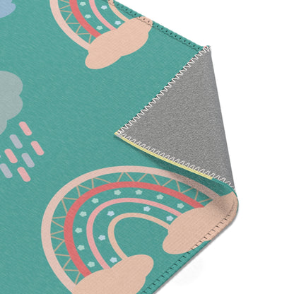 Teal Sky Rainbows nursery rug pattern shown flat
