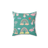Teal Sky Rainbows decorative nursery pillow on a glider chair