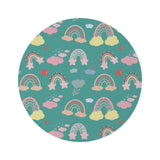 Teal Sky Rainbows round nursery rug on a baby room floor