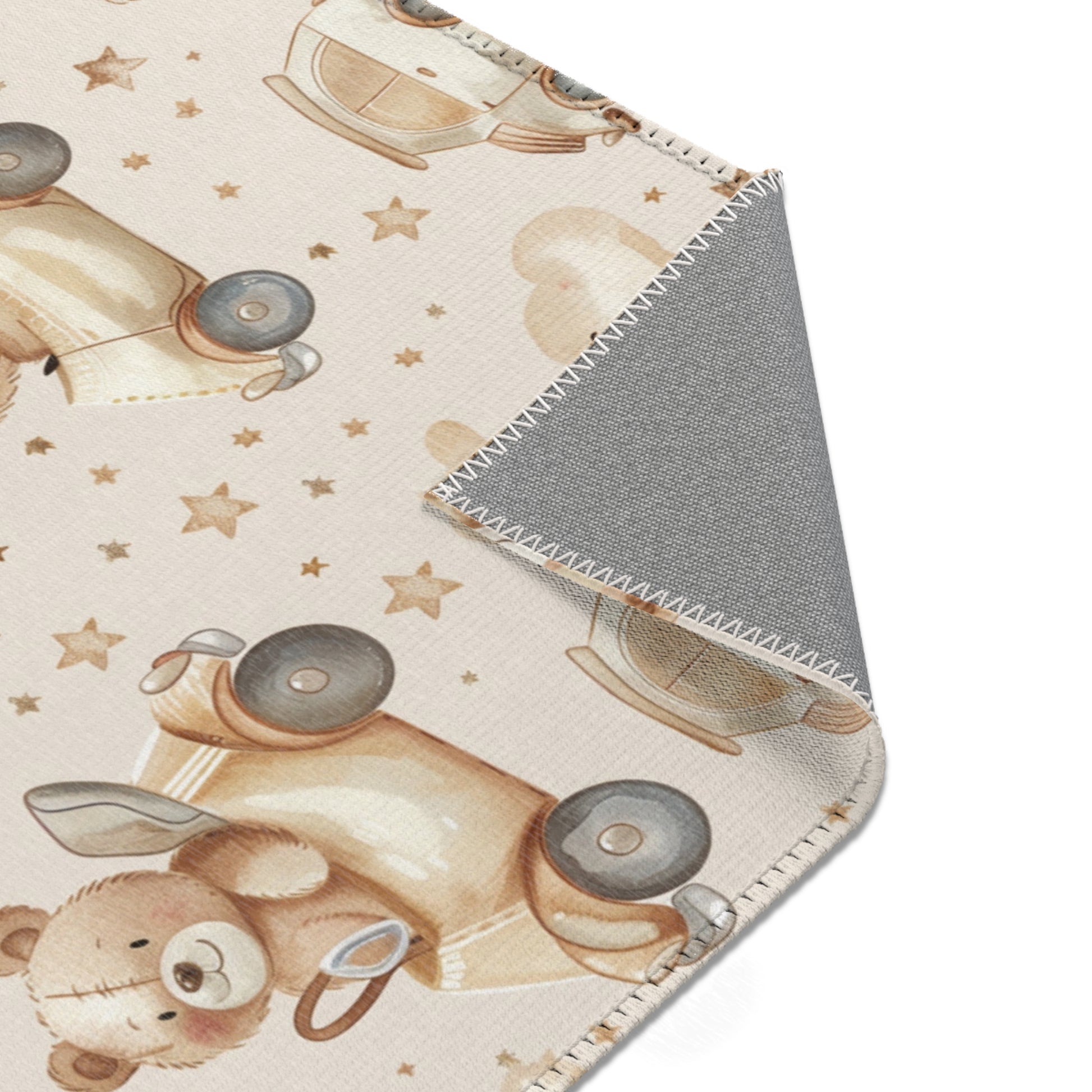 Teddy bear rug in tan and cream for a nursery floor