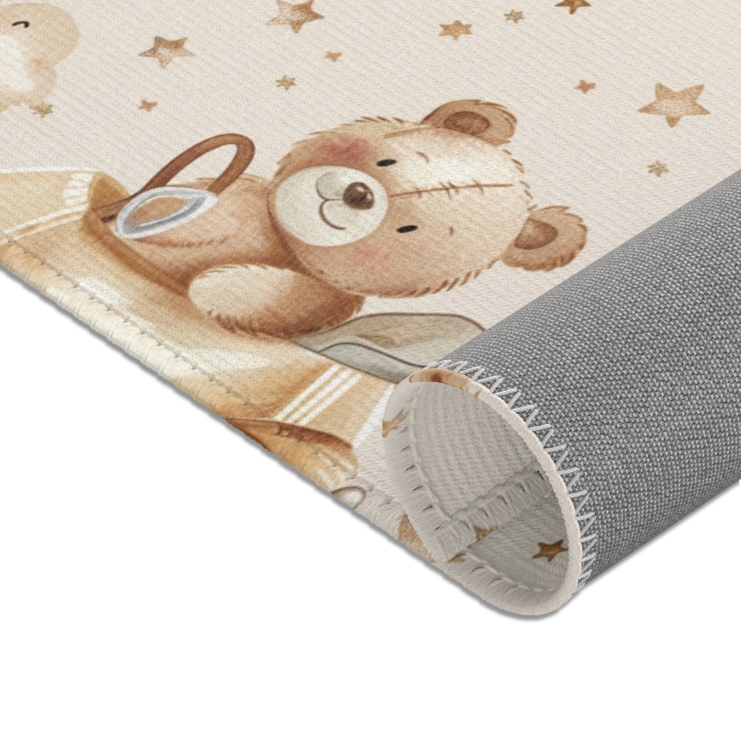Nursery area rug in a tan, cream and beige palette