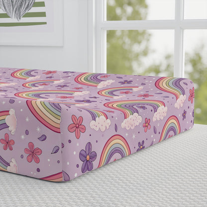 Close detail of the Violet Sky Rainbows print on the changing pad cover