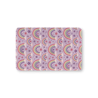 Violet Sky Rainbows fitted crib sheet on a nursery crib mattress