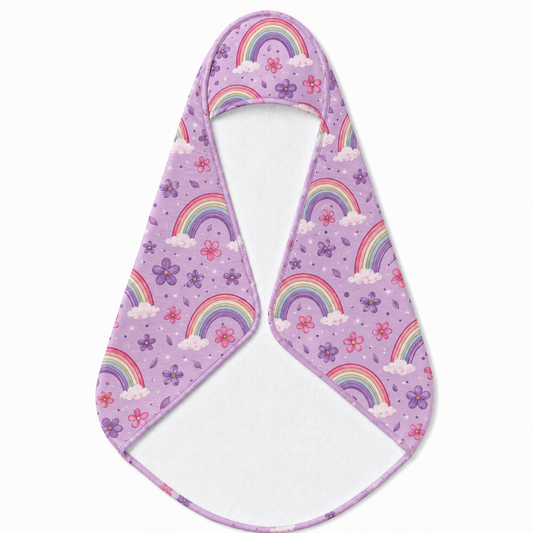 Violet Sky Rainbows hooded baby towel wrapped around a baby