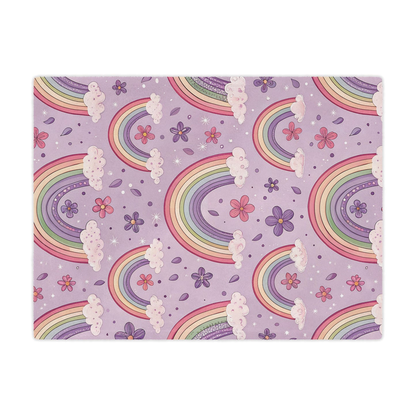Close detail of a pastel rainbow on the minky baby blanket