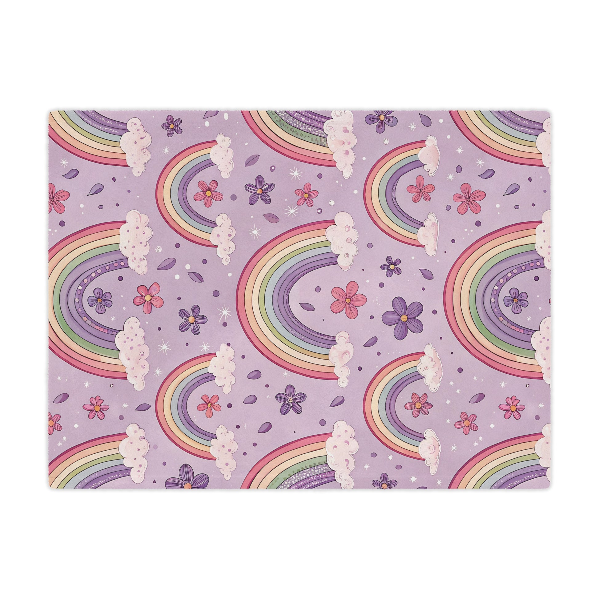 Close detail of a pastel rainbow on the minky baby blanket