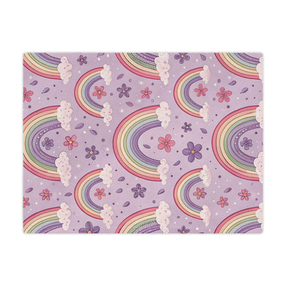 Close detail of a pastel rainbow on the minky baby blanket