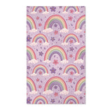 Pastel rainbow nursery area rug on a lilac ground