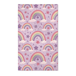 Pastel rainbow nursery area rug on a lilac ground