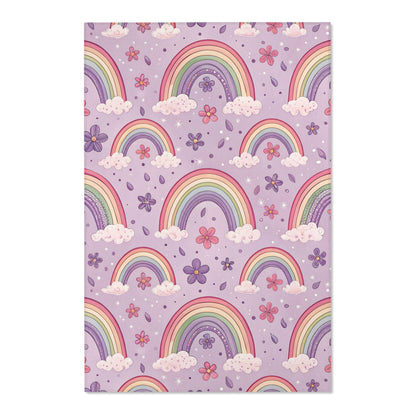 Close detail of the rainbows and flowers on the area rug