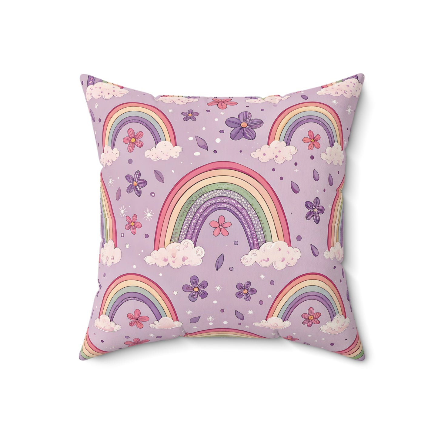 Close detail of the rainbow and cloud print on the faux suede pillow