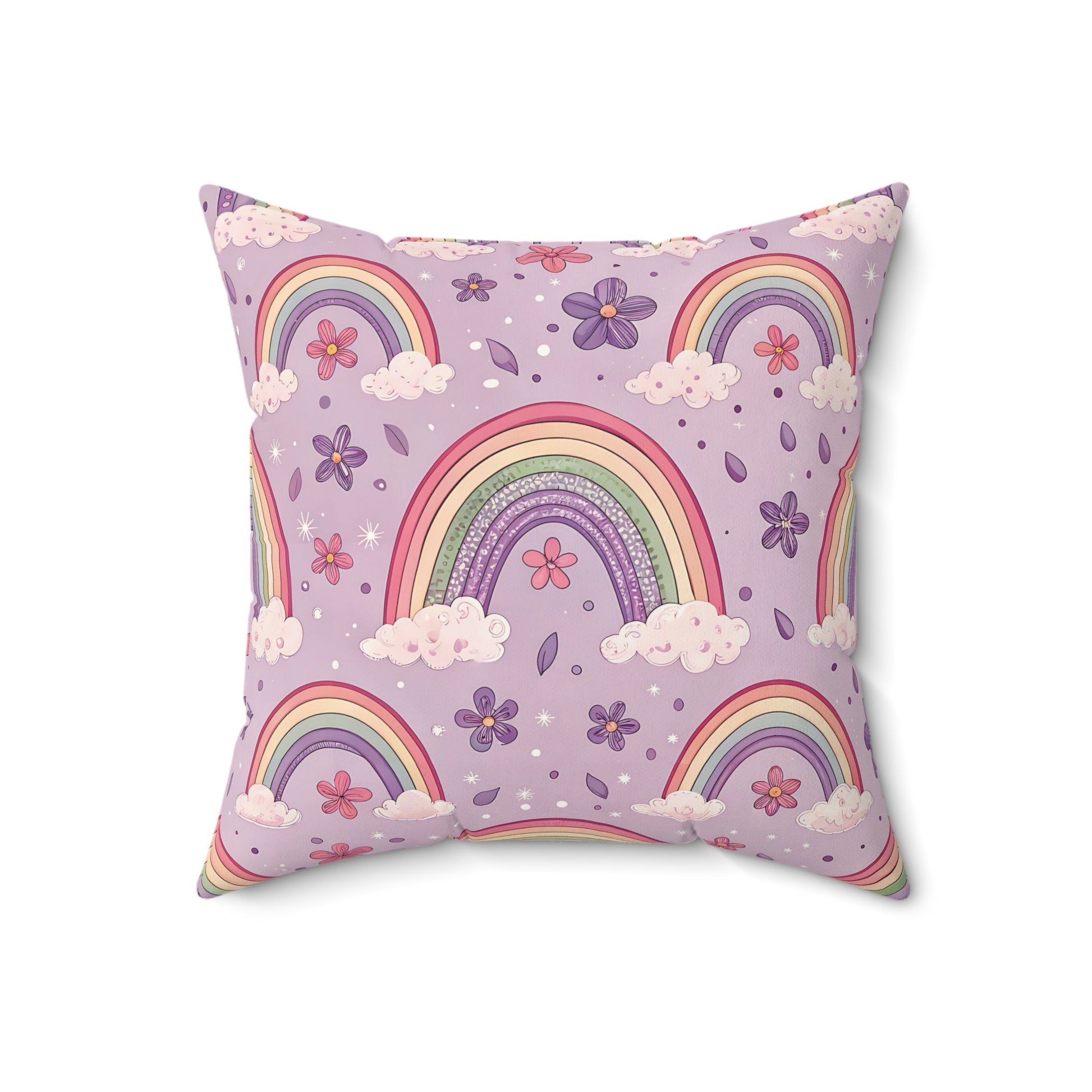 Close detail of the rainbow and cloud print on the faux suede pillow