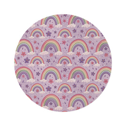 Violet Sky Rainbows round nursery rug on a baby room floor