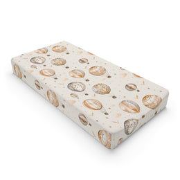Wandering Balloons changing pad cover on a nursery changing table