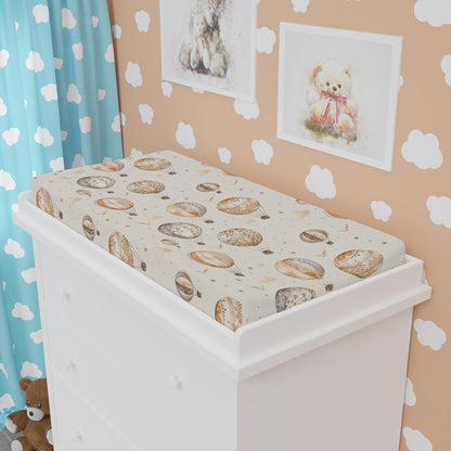 Wandering Balloons changing pad cover fitted over a contoured pad