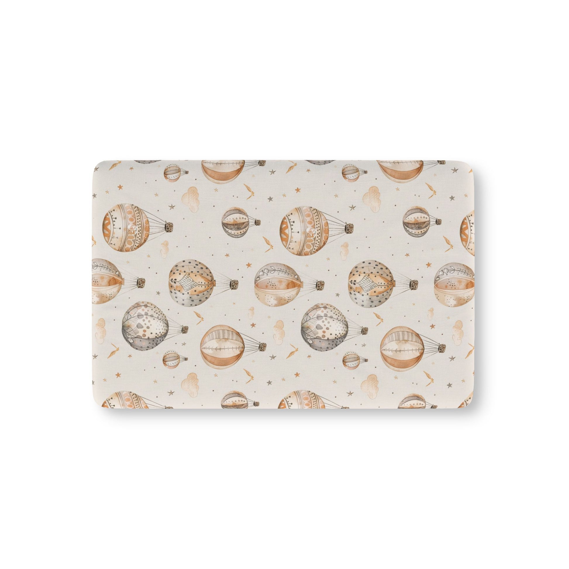 Wandering Balloons fitted crib sheet on a nursery crib mattress