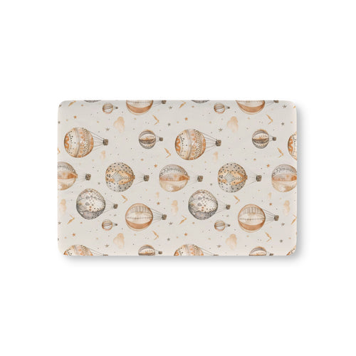 Wandering Balloons fitted crib sheet on a nursery crib mattress