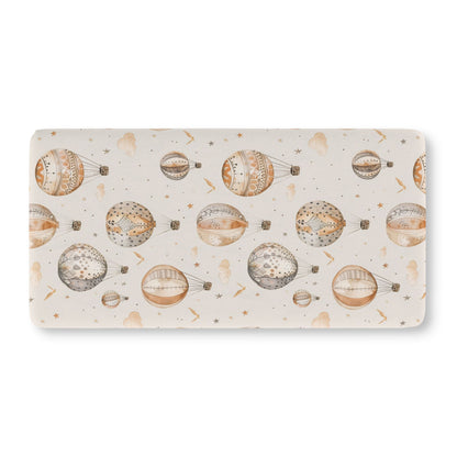 Fitted crib sheet with tan and grey hot air balloons on cream