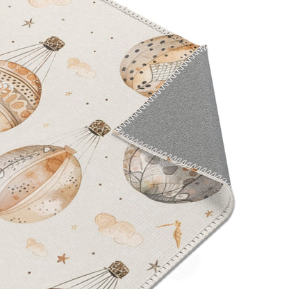 Balloon rug in tan and grey on cream for a nursery floor