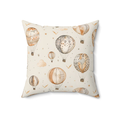 Close detail of the balloon and cloud print on the faux suede pillow