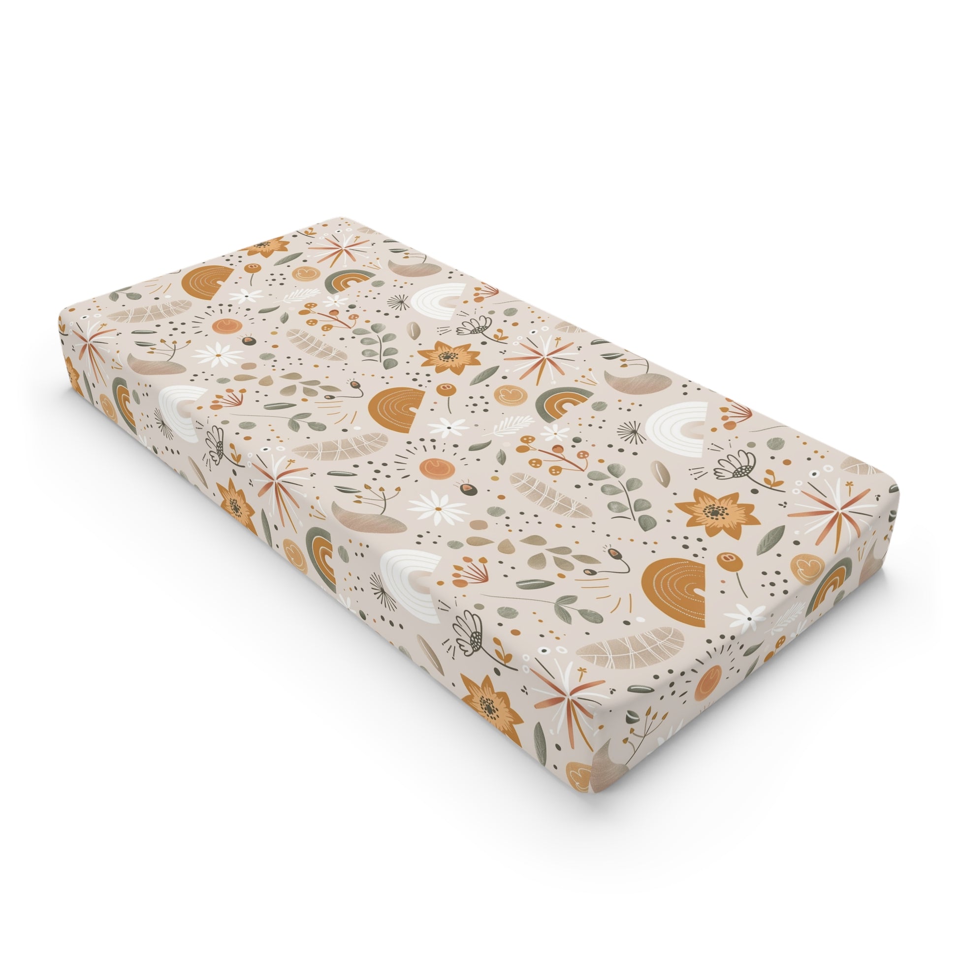 Wildflower Rainbow changing pad cover on a nursery changing table