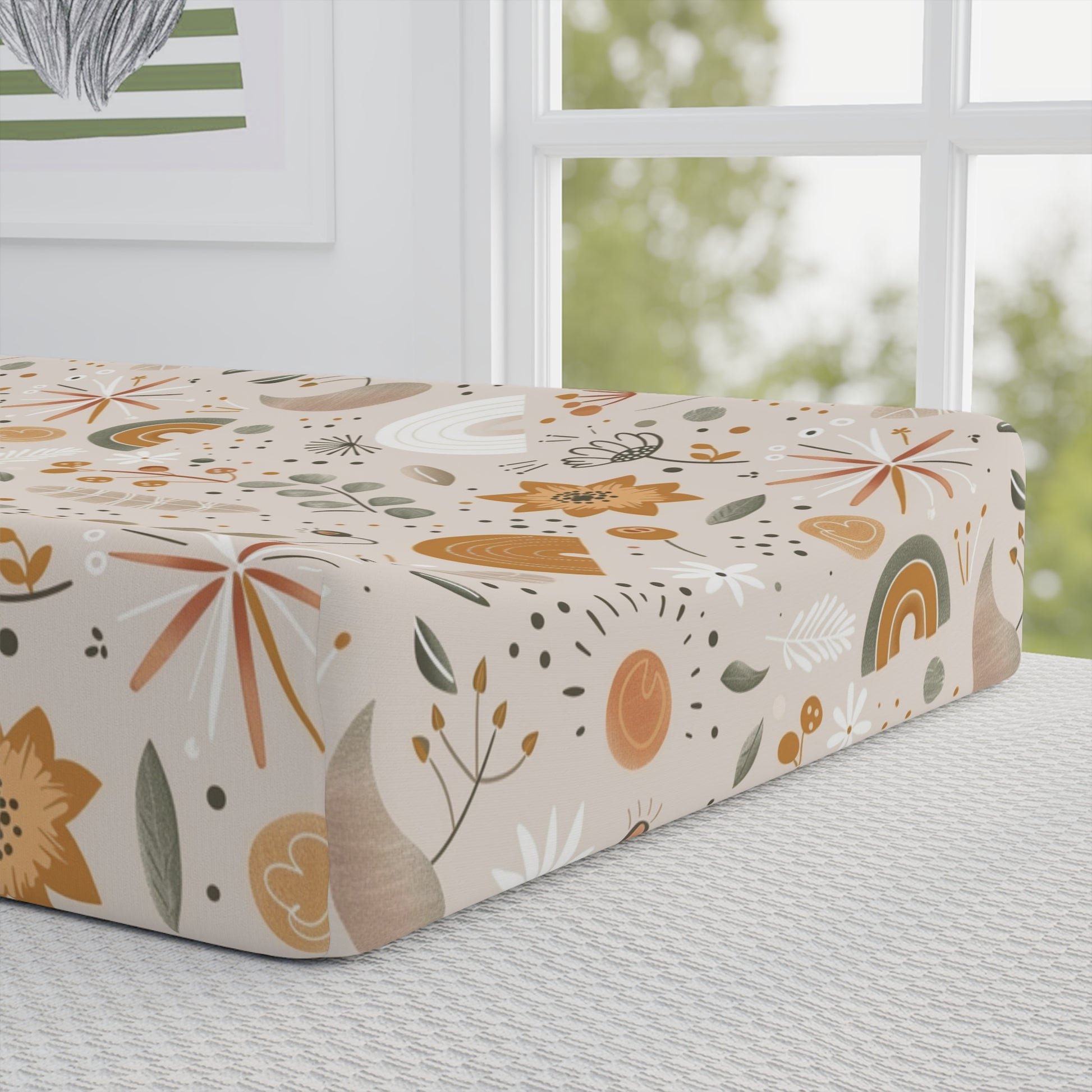Close detail of the Wildflower Rainbow print on the changing pad cover