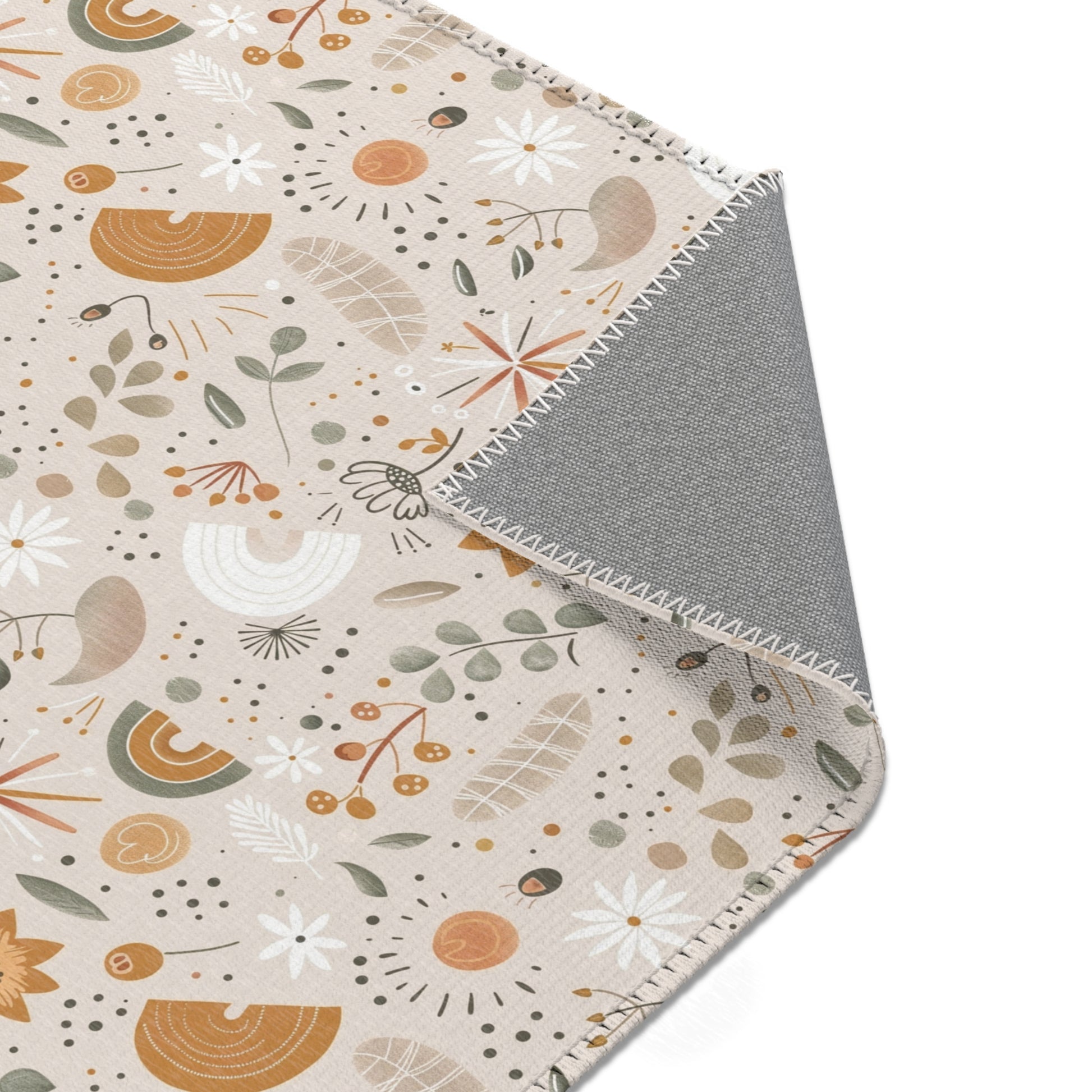 Nursery area rug printed edge to edge with wildflowers