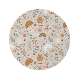 Wildflower Rainbow round nursery rug on a baby room floor